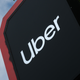 A sign stands outside an Uber drivers registration office on May 10, 2019 in Berlin, Germany.
